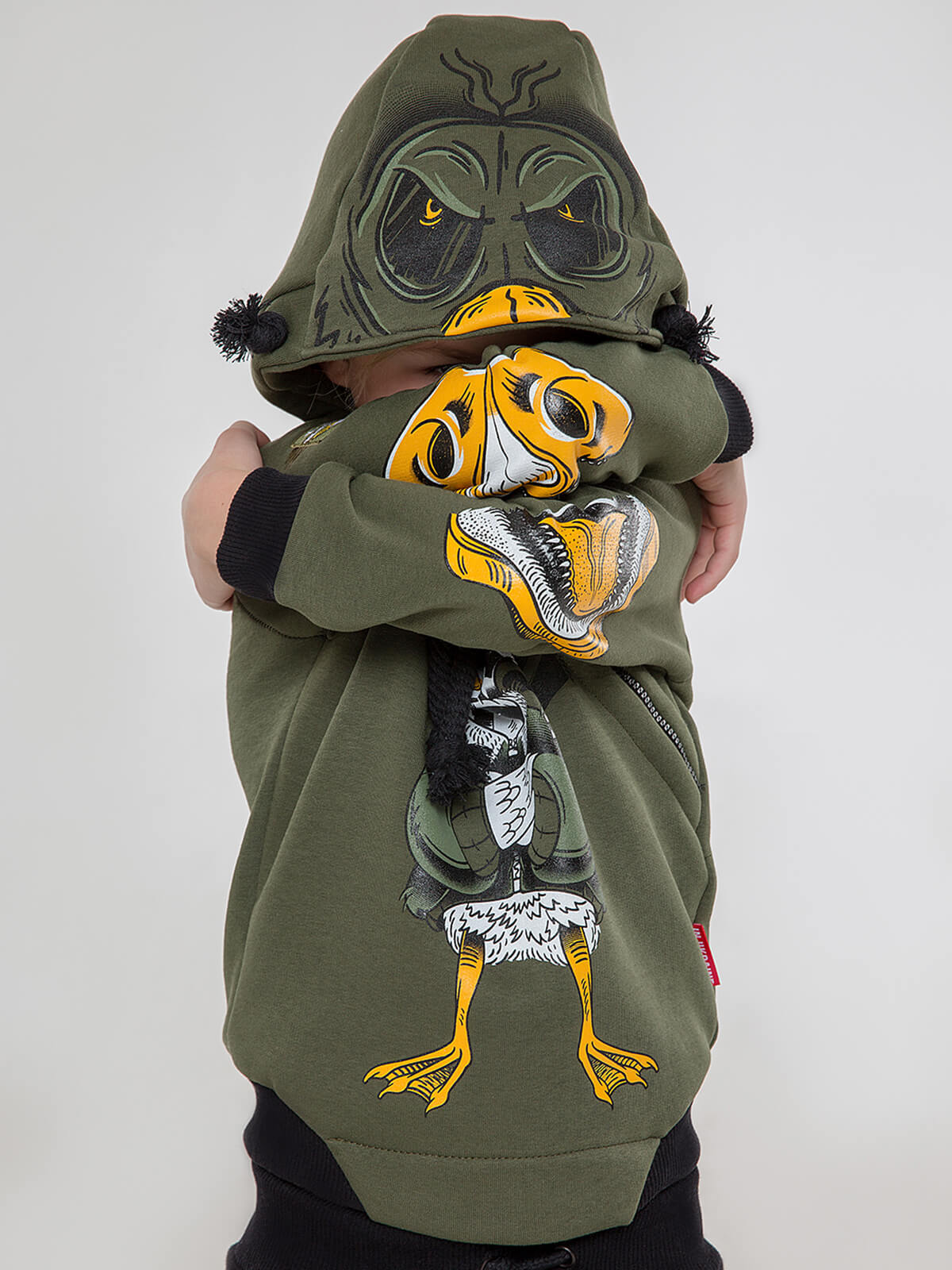 Kids Hoodie Goose. Color khaki. 
Material of the hoodie – three-cord thread fabric: 77% cotton, 23% polyester.