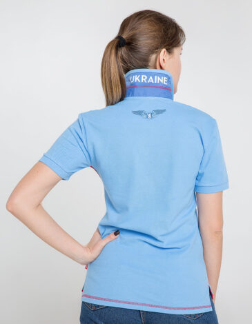 Women's Polo Shirt Wings. Color sky blue. 
Size worn by the model: S.