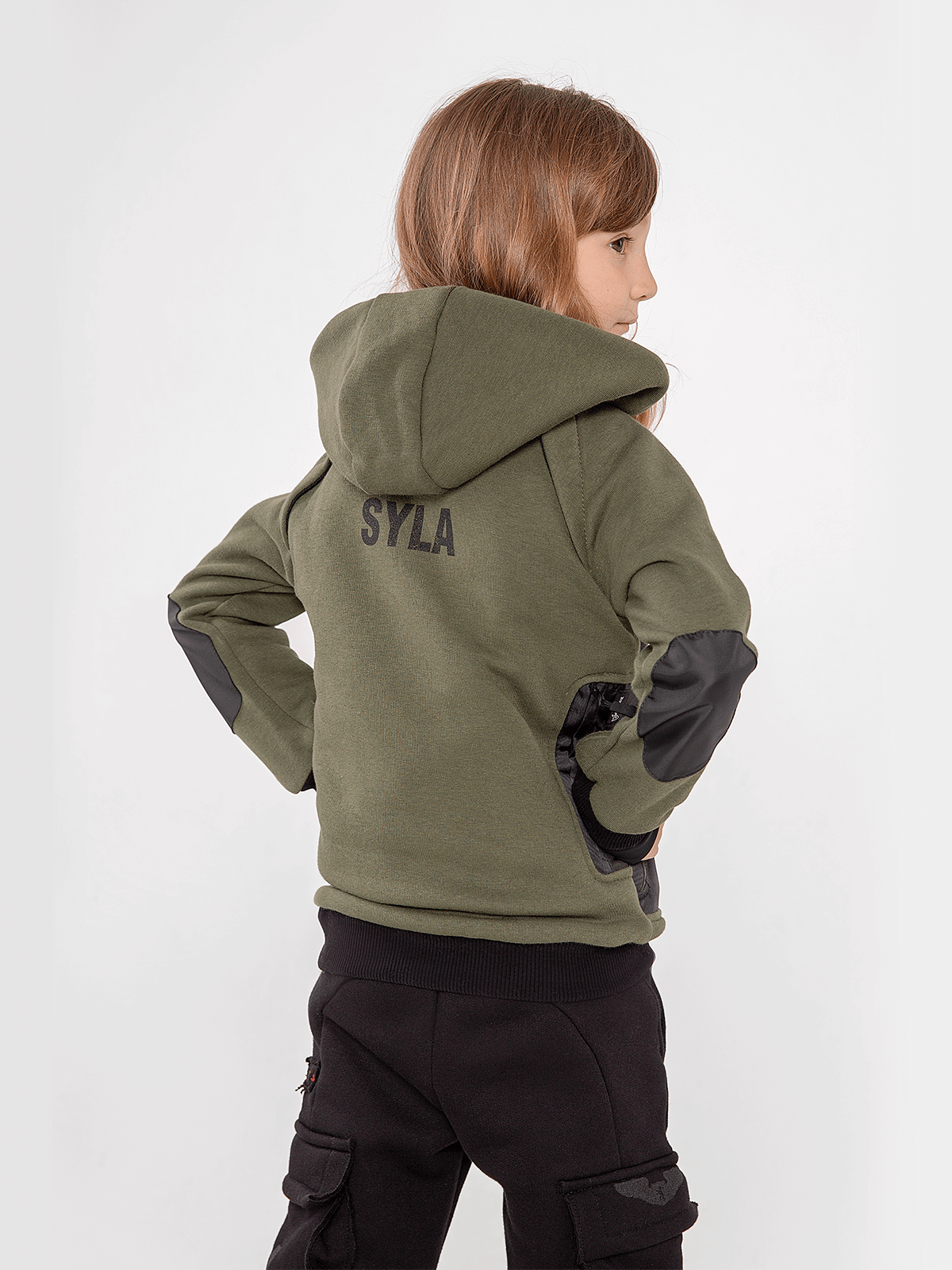 Kids Hoodie Syla. Color khaki. 
Material of the inserts – oxford cloth, 100% polyester.