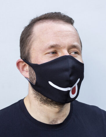 Mask Smile. Color black. Reusable protective mask with a pocket for a replaceable filter
Basic material (outer layer): scuba fabric (rayon 65%, lycra 5%, polyester 30%) – light-weight, elastic and smooth material that dries quickly and fits the face line effectively.