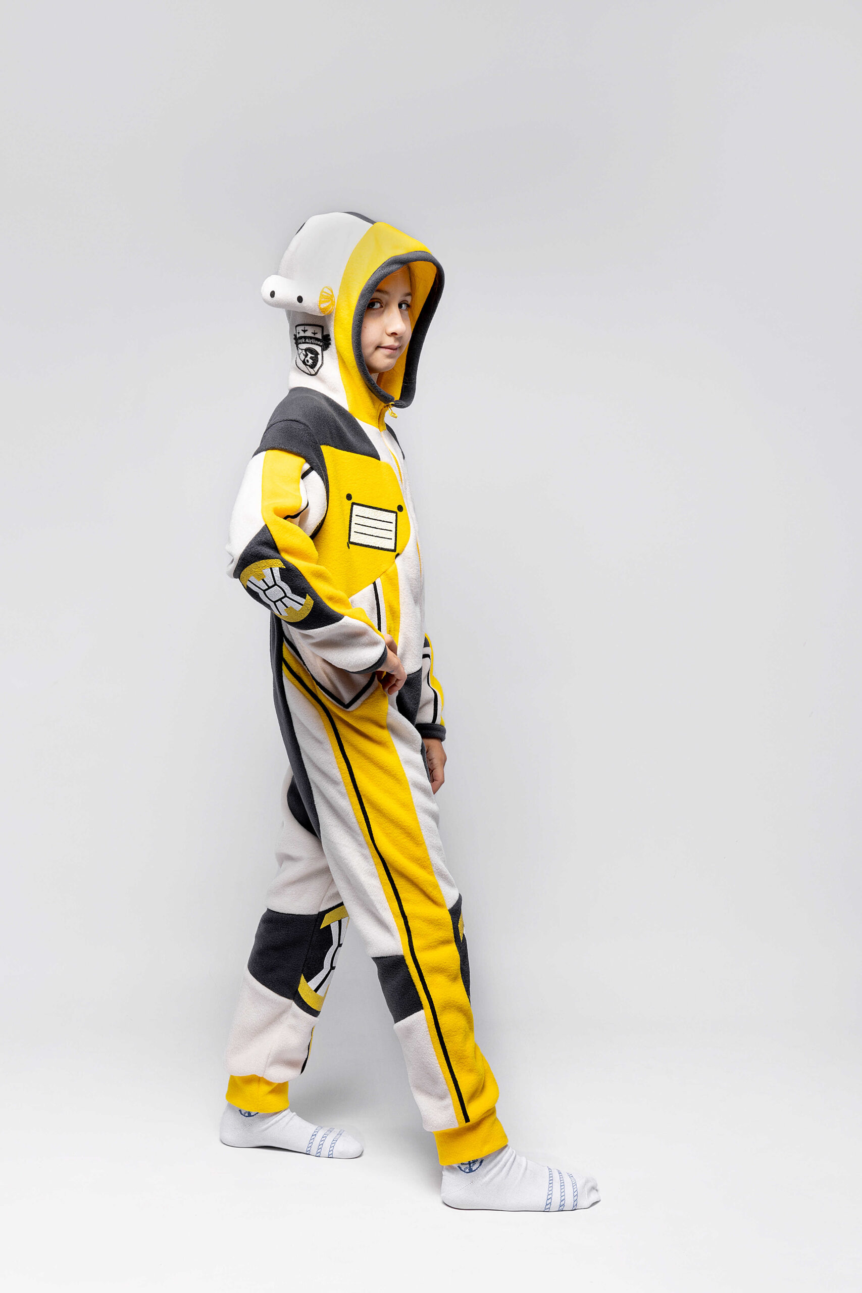 Pajamas Spacesuit. Color yellow. 
Technique of prints applied: silkscreen printing.